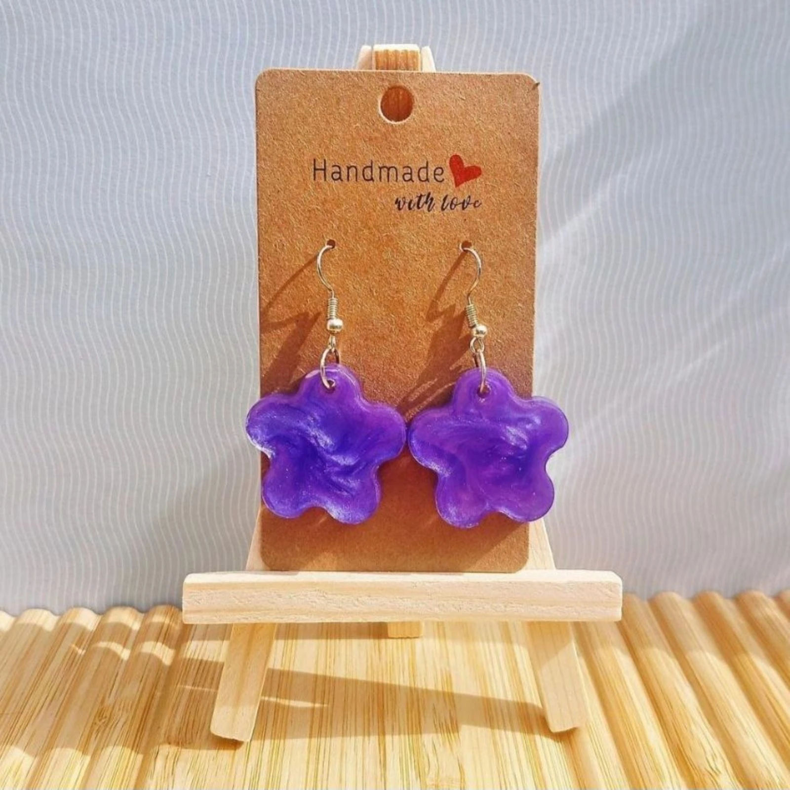 Boucles d'oreilles fleurs mauves 